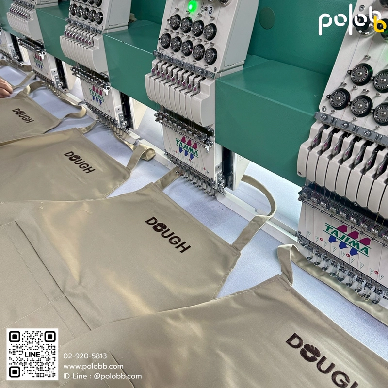 ผ้ากันเปื้อนผ้าคอมทวิว ปักโลโก้แบรนด์